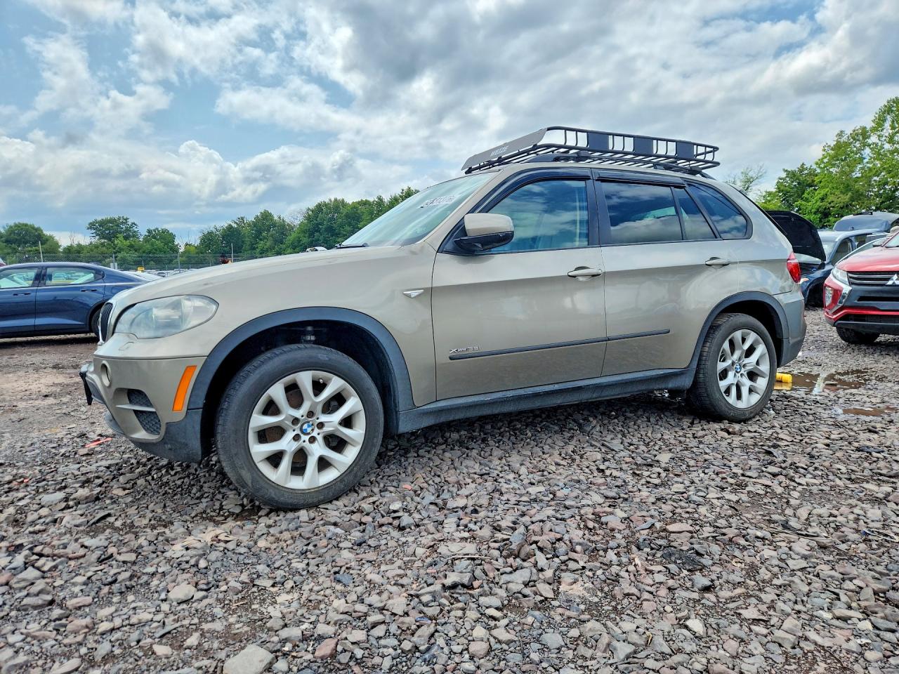 2011 BMW X5 35i, VIN 5UXZV4C58BL741925 — Зад