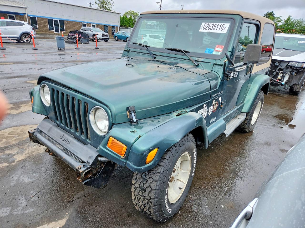 2000 Jeep Wrangler Sahara, VIN 1J4FA59SXYP770552 — Front end