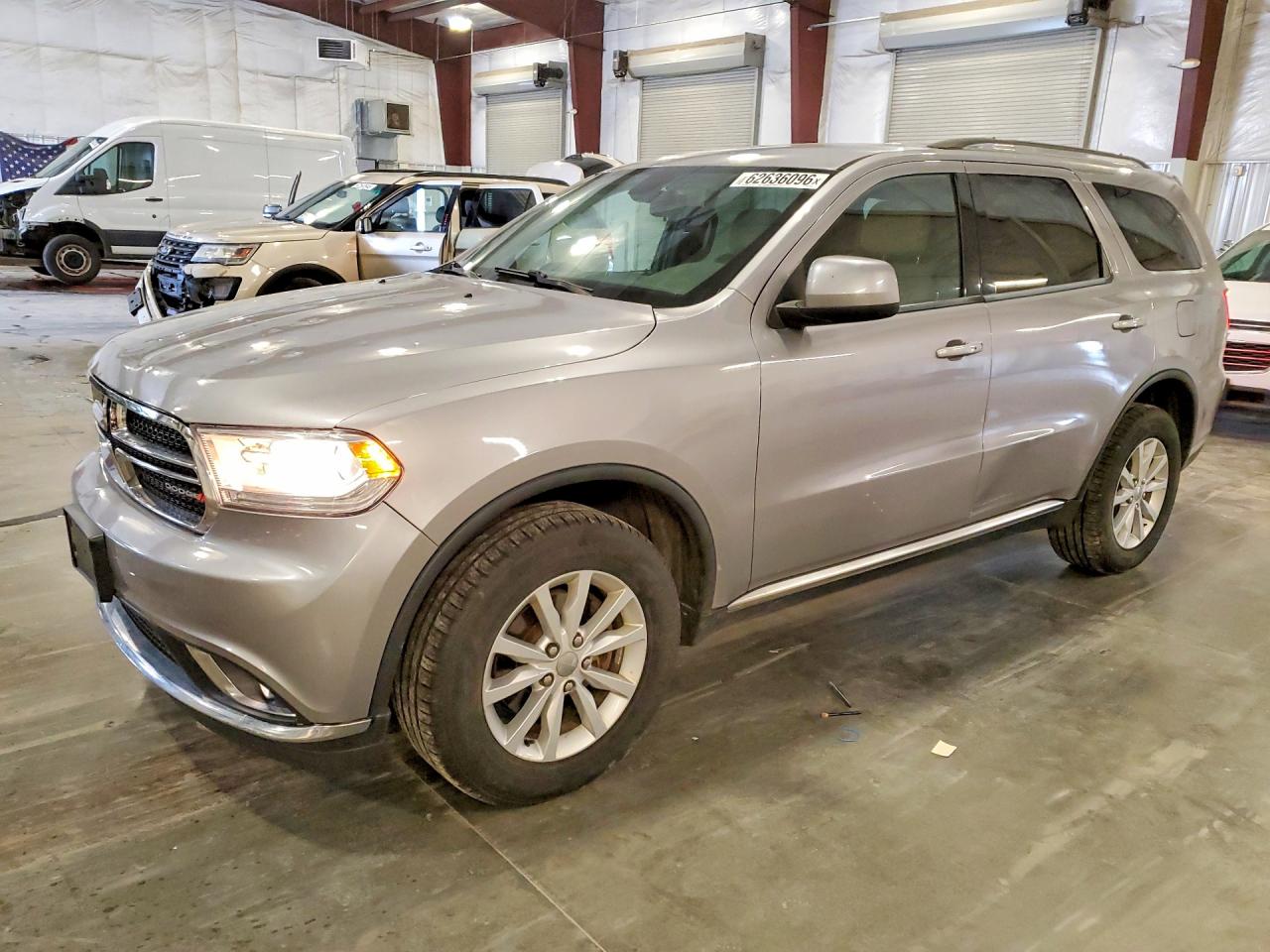 2015 Dodge Durango SXT, VIN 1C4RDJAG6FC938136 — Hail