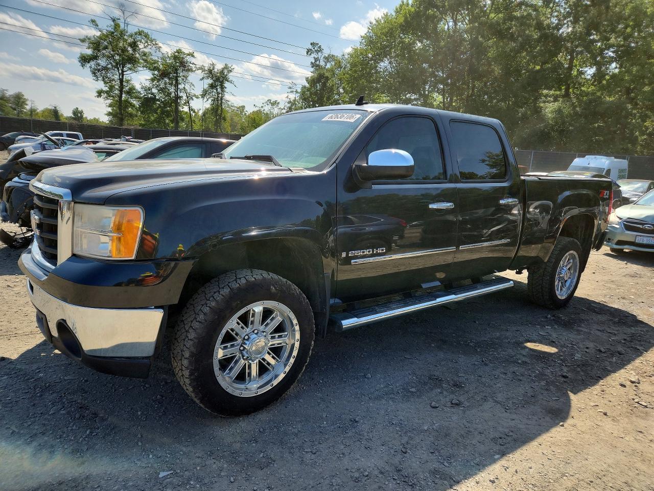 2009 GMC Sierra 2500HD SLE, VIN 1GTHK53K59F113802 — Side
