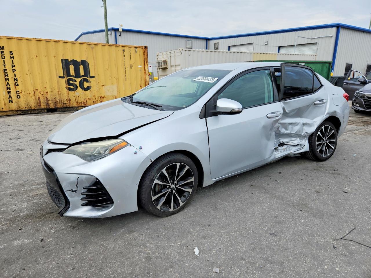 2018 Toyota Corolla LE, VIN 2T1BURHE1JC975051 — Side