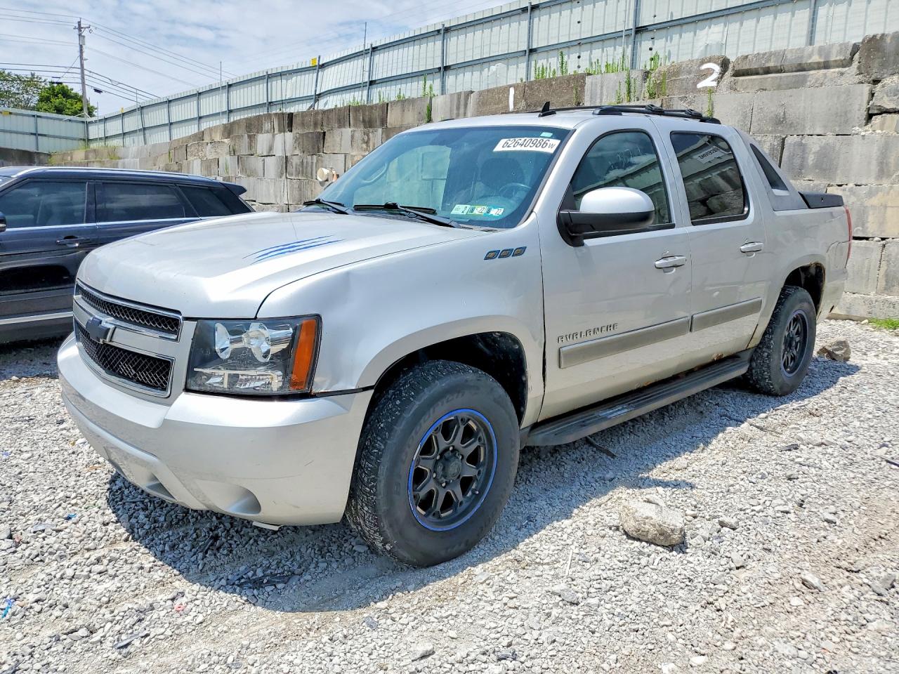 2011 Chevrolet Avalanche LS, VIN 3GNTKEE34BG138587 — Rear end