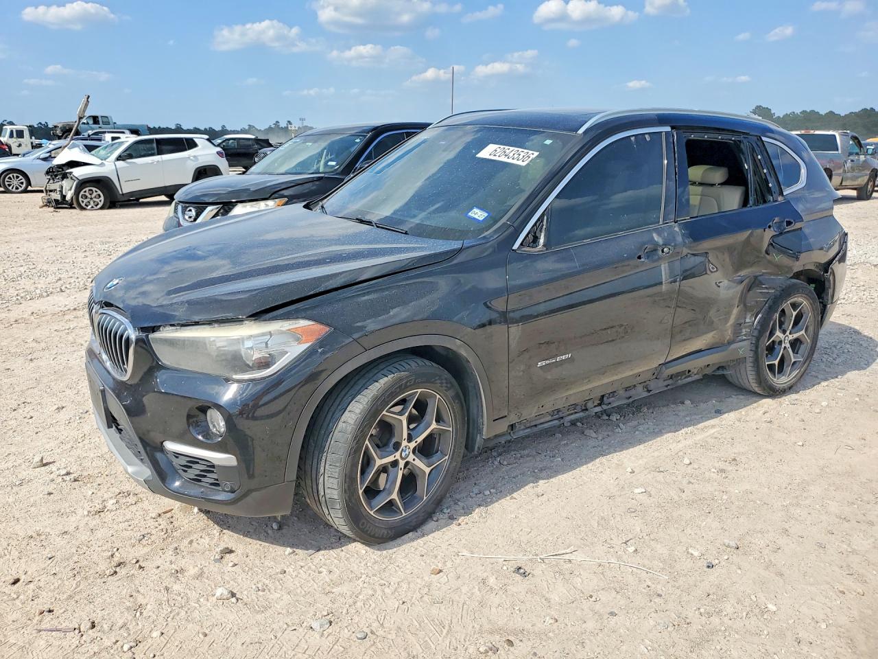 2017 BMW X1 sDrive28i, VIN WBXHU7C33H5H37560 — Side