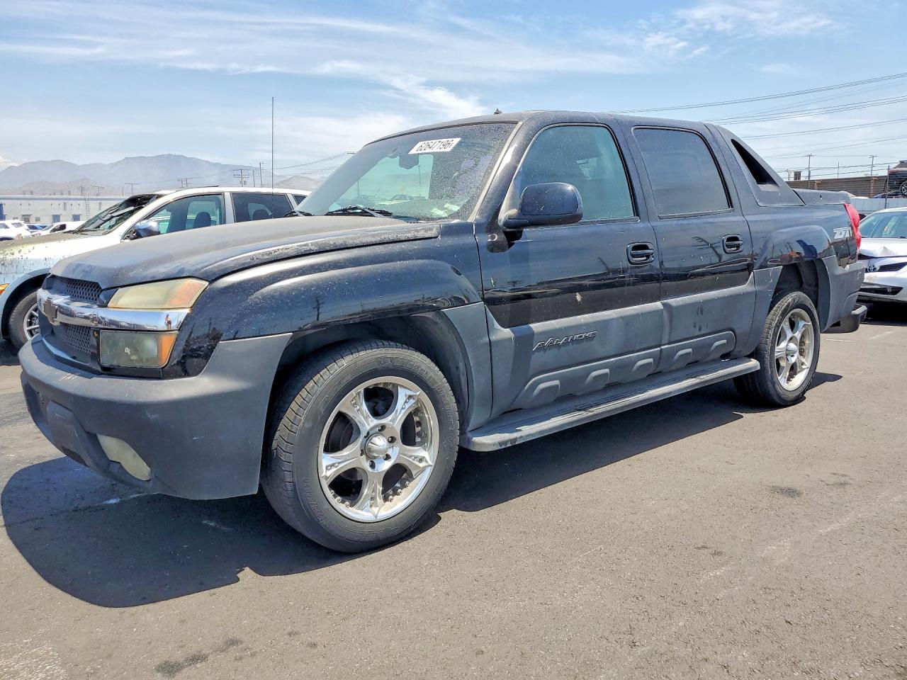 2002 Chevrolet Avalanche, VIN 3GNEK13T52G107434 — Зад