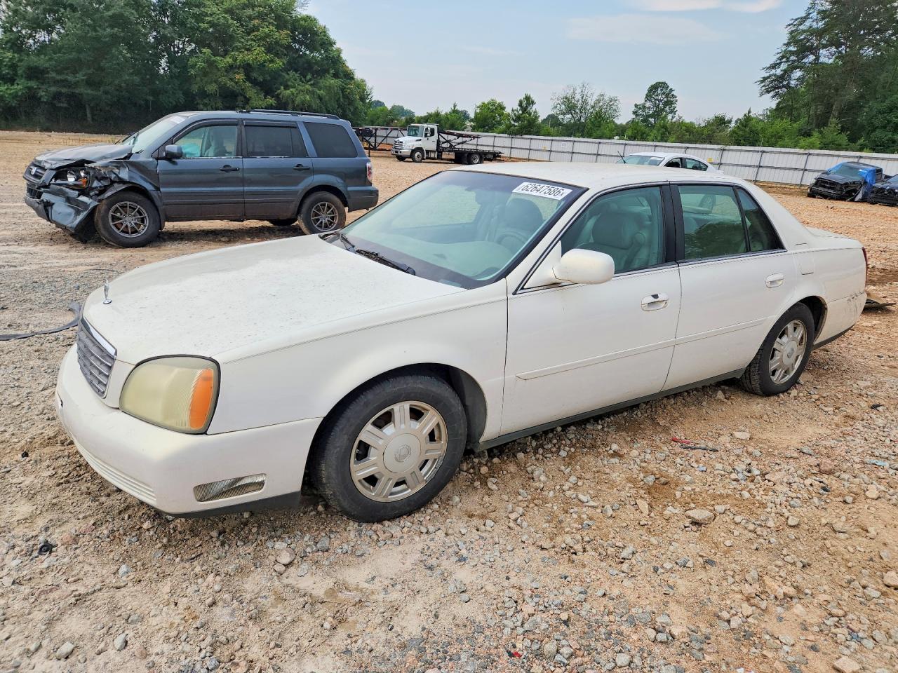 2004 Cadillac DeVille, VIN 1G6KD54Y94U138034 — Rear end
