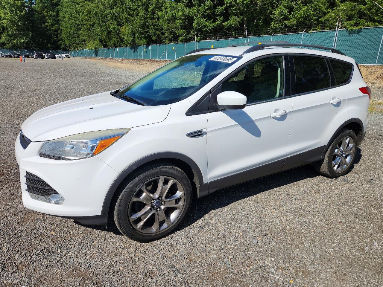 2015 Ford Escape SE, VIN 1FMCU9G98FUA31665 — Side