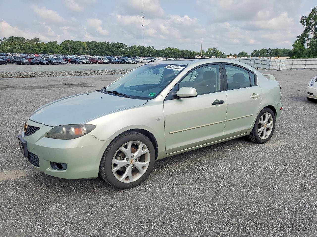 2008 Mazda 3 i Touring Value, VIN JM1BK32F881147596 — Side