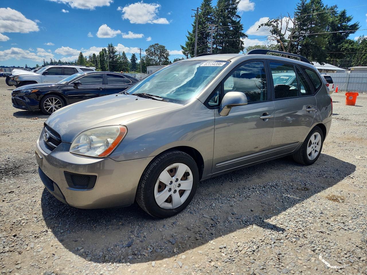 2010 Kia Rondo, VIN KNAHG8A99A7293963 — Side