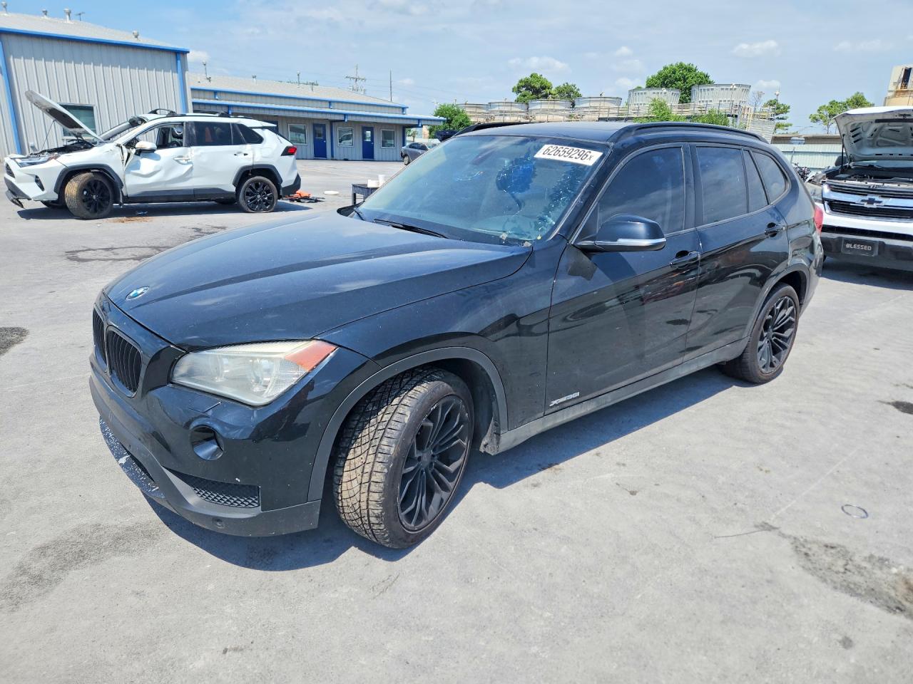 2014 BMW X1 xDrive35i, VIN WBAVM5C56EVV93210 — Side