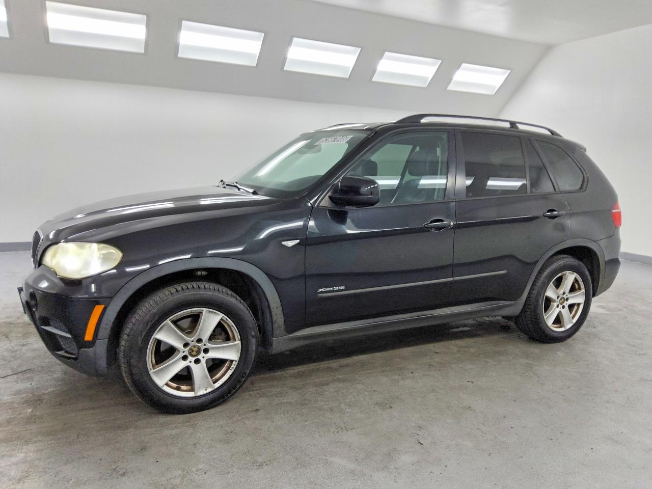 2012 BMW X5 35i, VIN 5UXZV4C55CL765052 — Бок