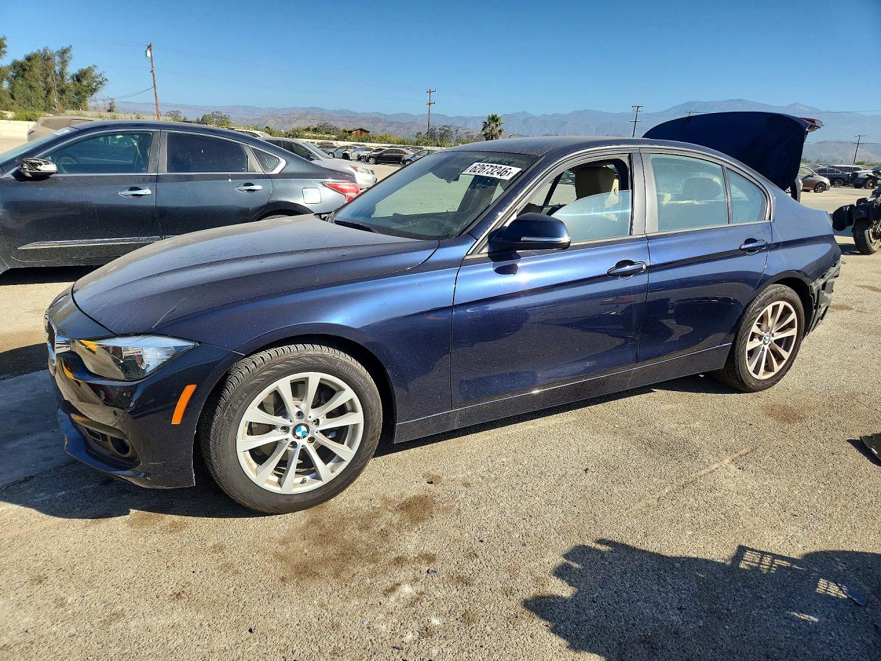 2017 BMW 3 Series 320i, VIN WBA8E1G3XHNU18751 — Rear end