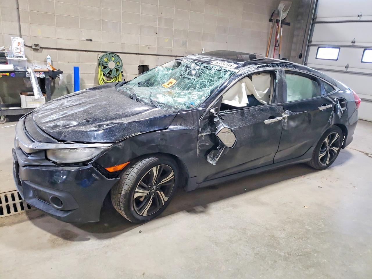 2016 Honda Civic Touring, VIN 19XFC1F96GE033972 — Rollover
