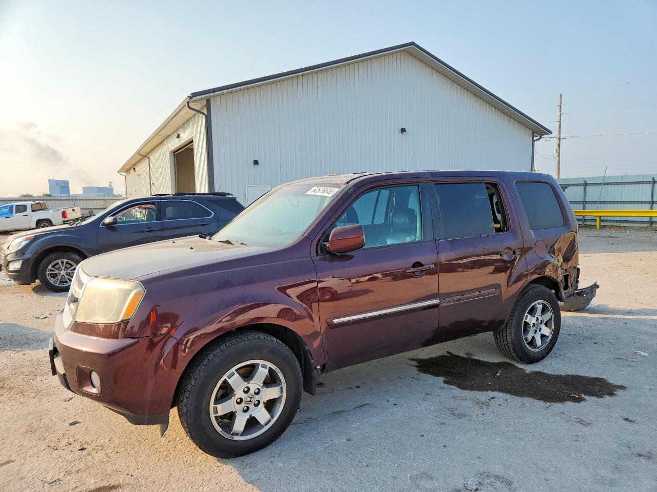 2011 Honda Pilot Touring, VIN 5FNYF4H95BB087488 — Зад