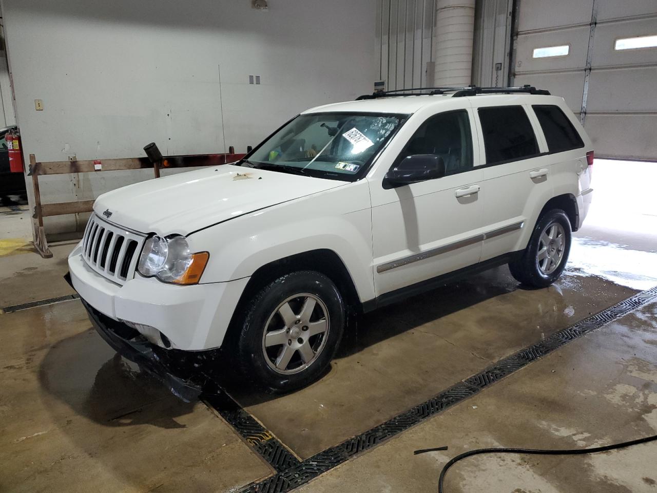 2010 Jeep Grand Cherokee Laredo, VIN 1J4PR4GK2AC127538 — Engine fire