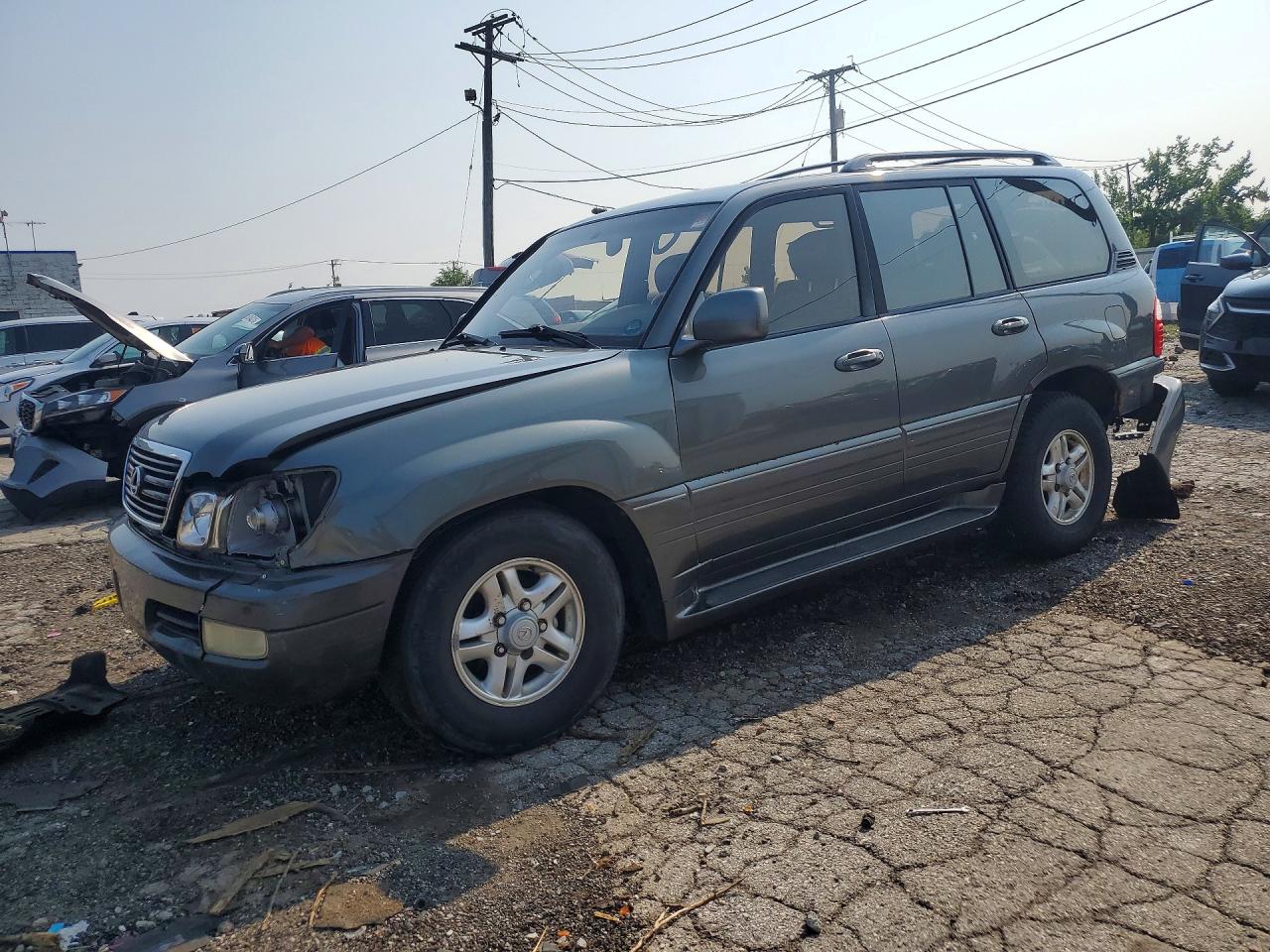 2000 Lexus LX 470, VIN JT6HT00W2Y0095808 — Minor dents and scratches