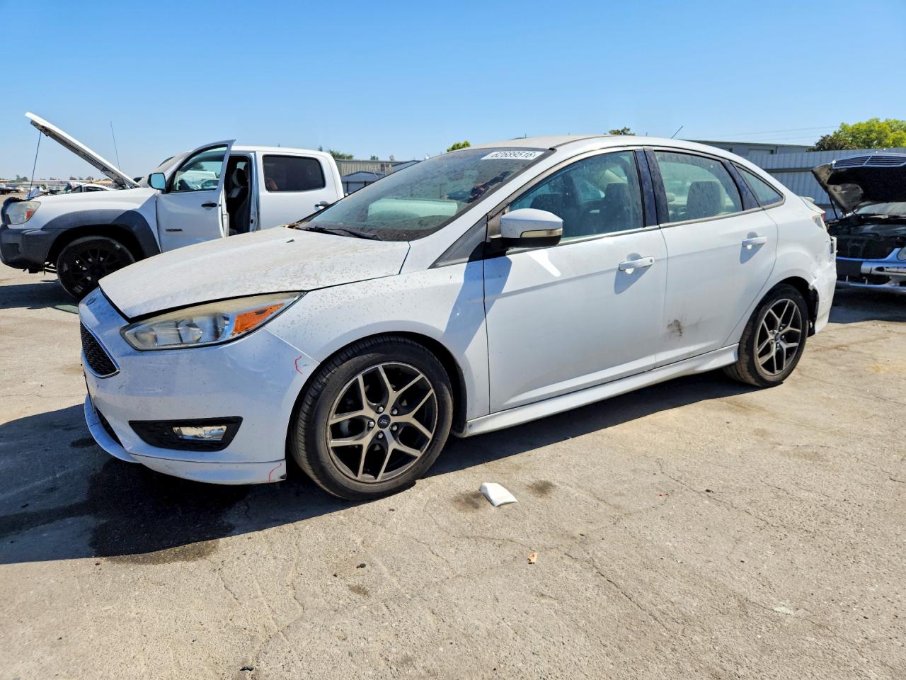 2015 Ford Focus SE, VIN 1FADP3F25FL221775 — Rear end
