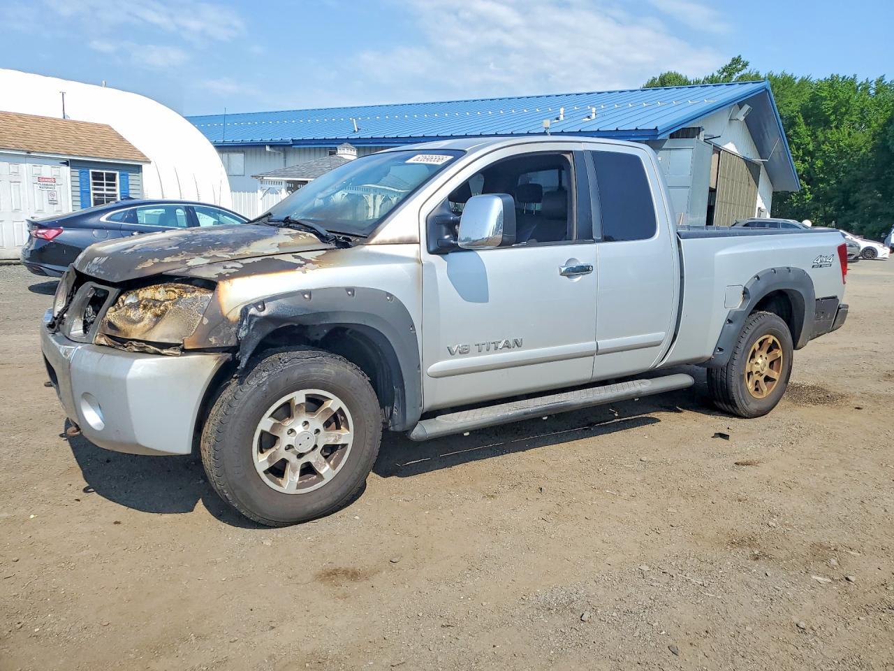 2005 Nissan Titan LE, VIN 1N6AA06B05N572445 — Engine fire