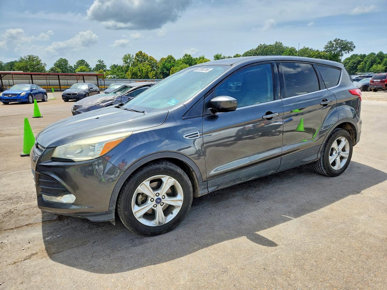 2016 Ford Escape SE, VIN 1FMCU0G75GUB18872 — Side