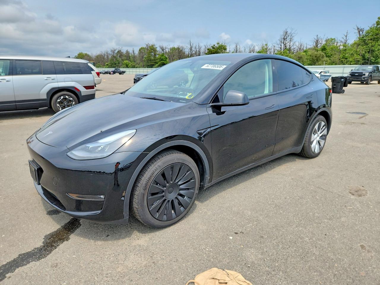 2024 Tesla Model Y Long Range, VIN 7SAYGAEE0RF987127 — Rear end