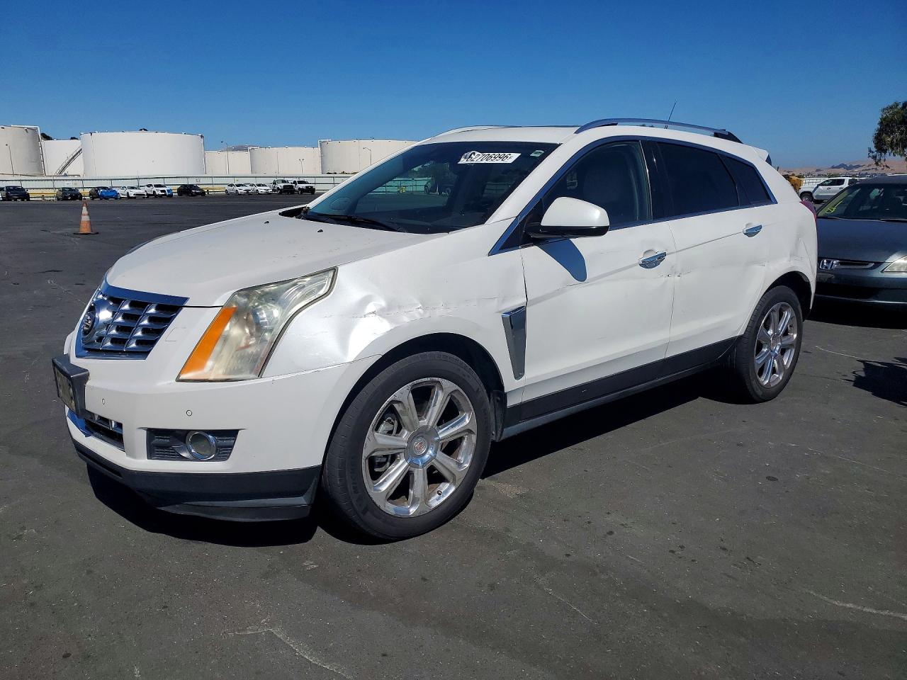 2014 Cadillac SRX Premium Collection, VIN 3GYFNGE37ES677435 — Front end