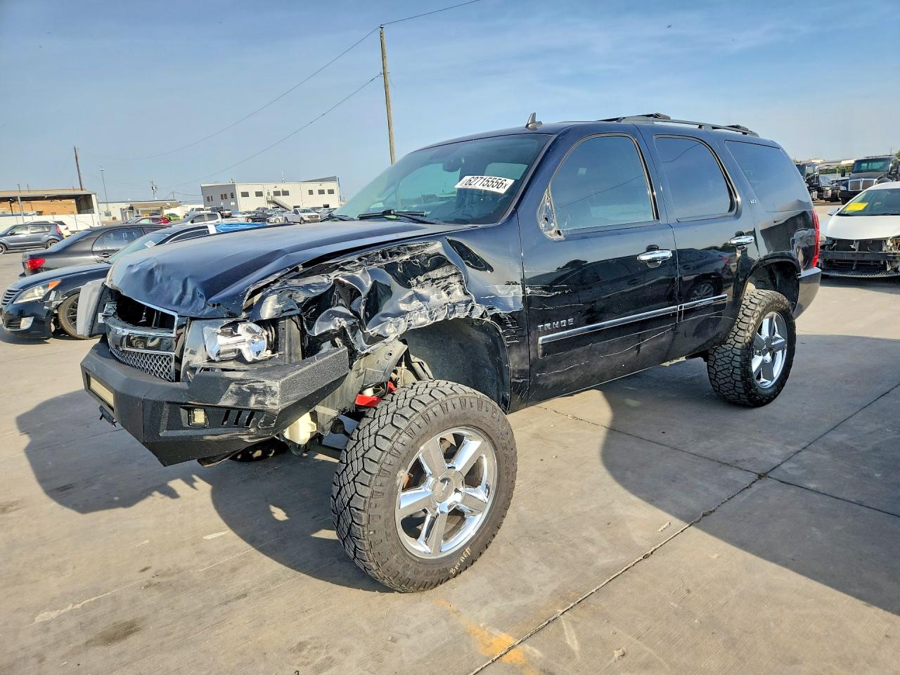 2011 Chevrolet Tahoe LTZ, VIN 1GNSCCE01BR271374 — Front end