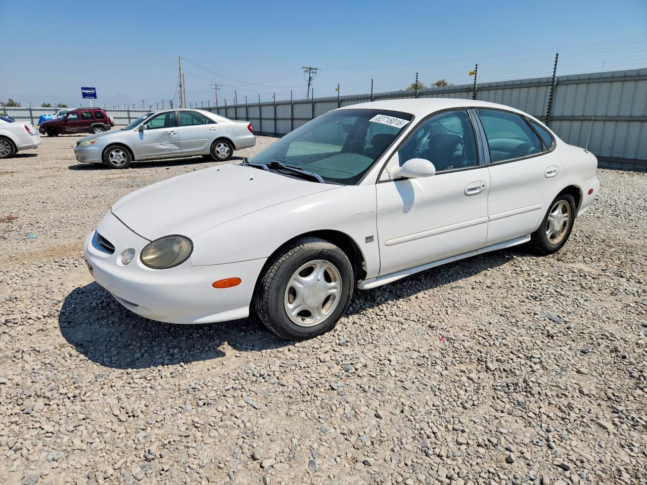1998 Ford Taurus LX, VIN 1FAFP52S4WG153049 — Мелкие вмятины и царапины
