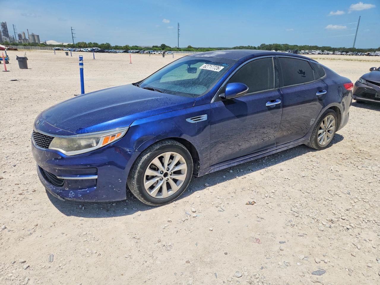 2016 Kia Optima LX, VIN 5XXGT4L37GG002386 — Side