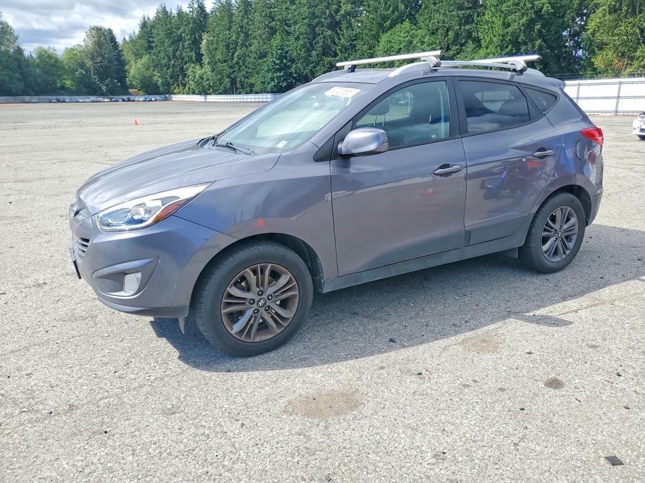 2015 Hyundai Tucson SE, VIN KM8JU3AG6FU055409 — Бок