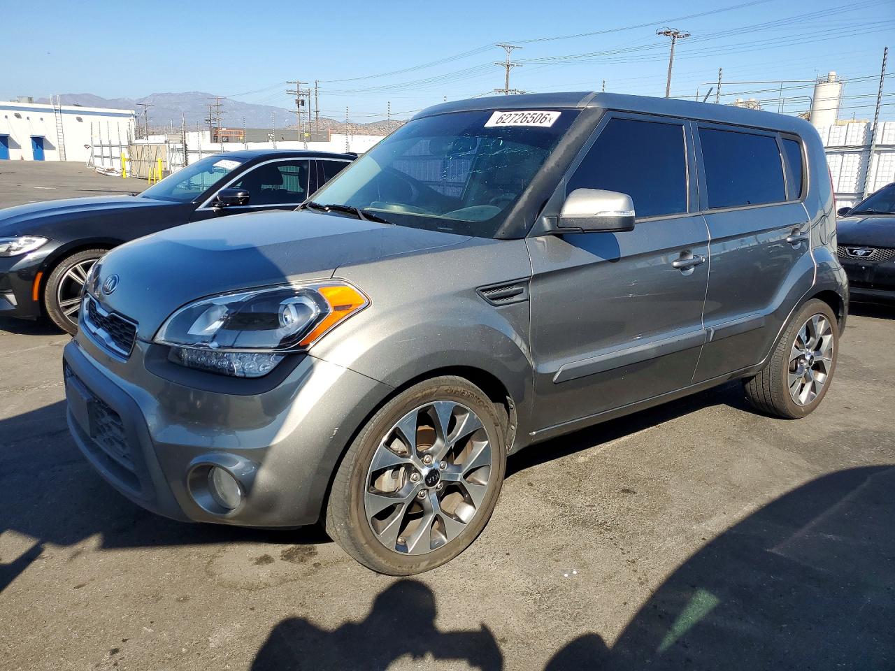 2012 Kia Soul +, VIN KNDJT2A60C7472592 — Side