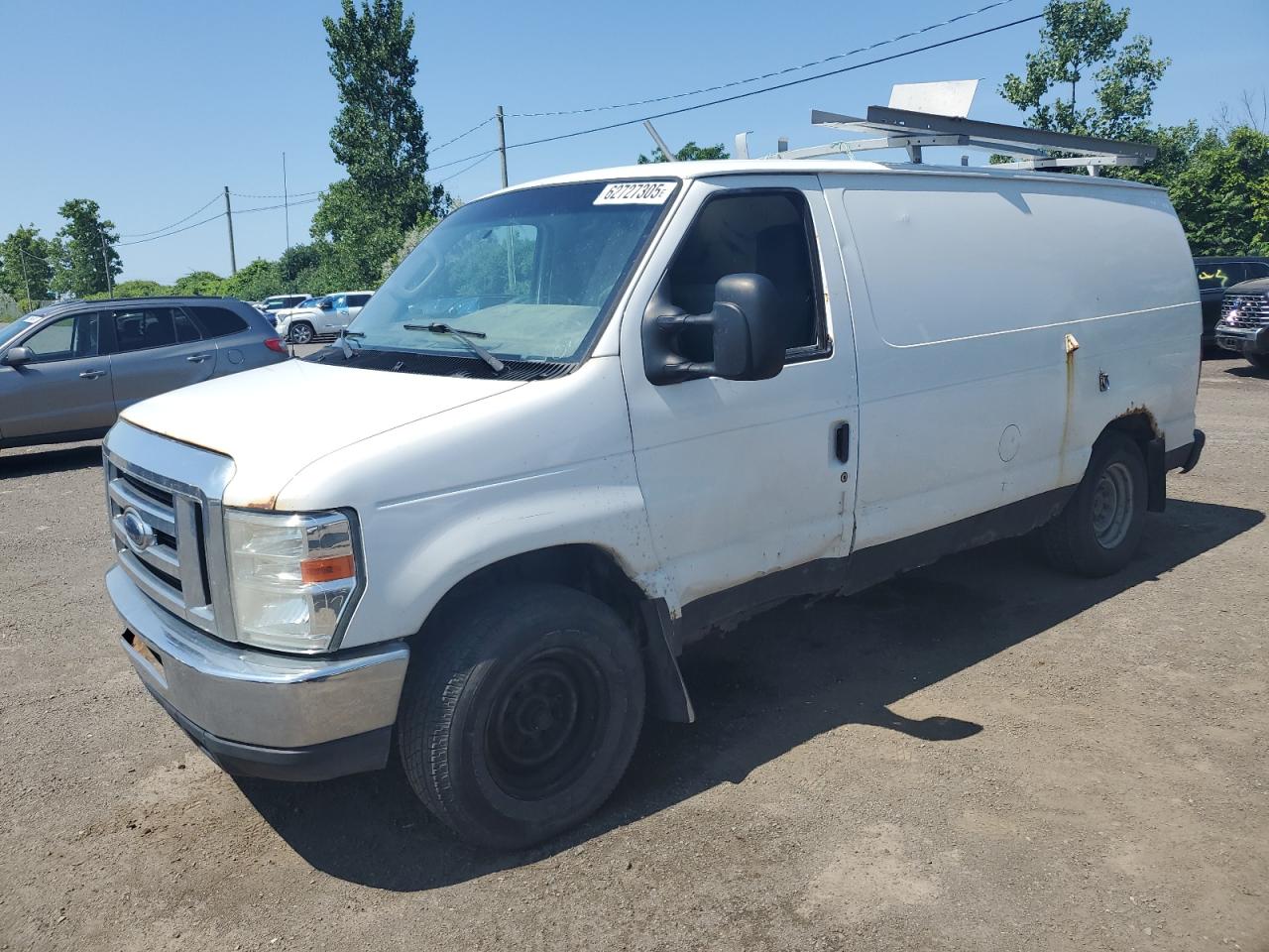 2012 Ford Econoline Cargo Commercial, VIN 1FTNE1EW6CDB32378 — Side