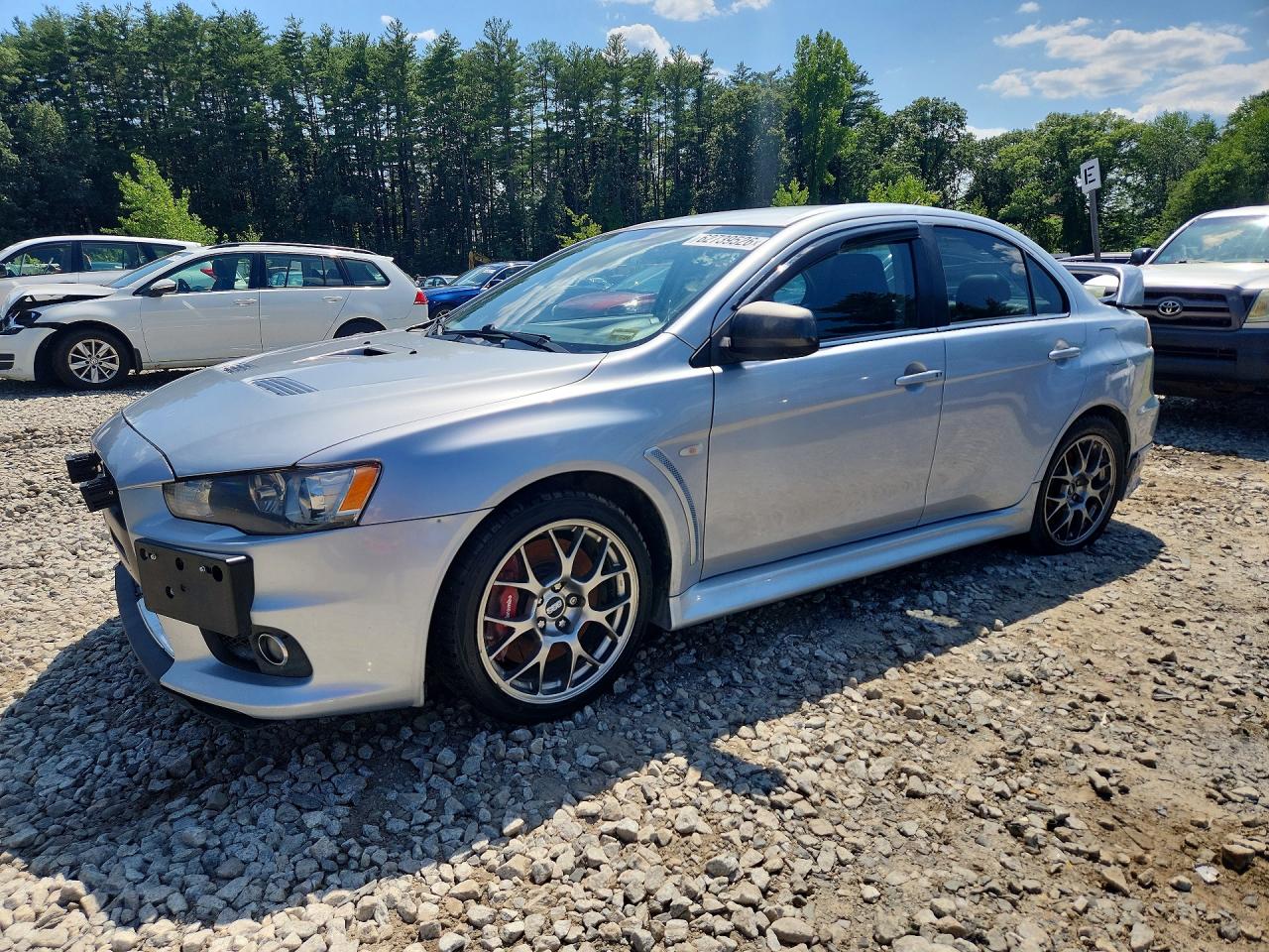 2014 Mitsubishi Lancer Evolution MR, VIN JA32W5FV0EU022361 — Мелкие вмятины и царапины
