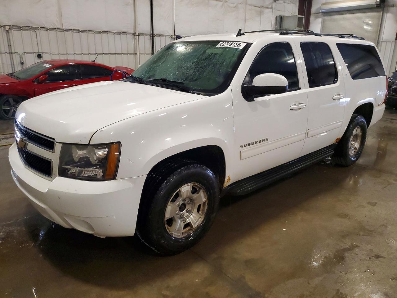 2011 Chevrolet Suburban LT, VIN 1GNSKJE36BR366384 — Hail