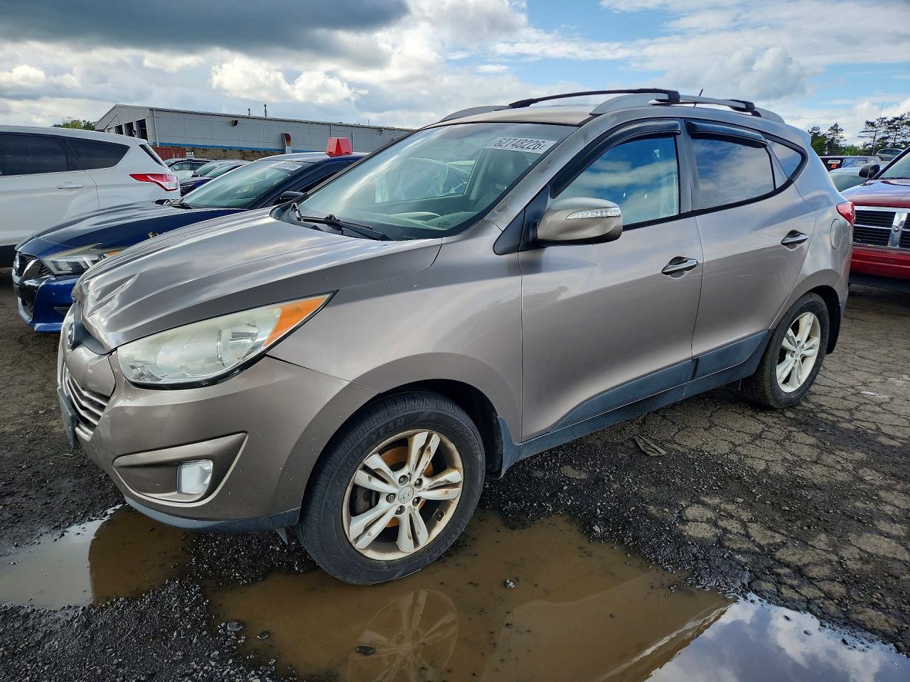 2013 Hyundai Tucson GLS, VIN KM8JUCAC7DU583387 — Front end