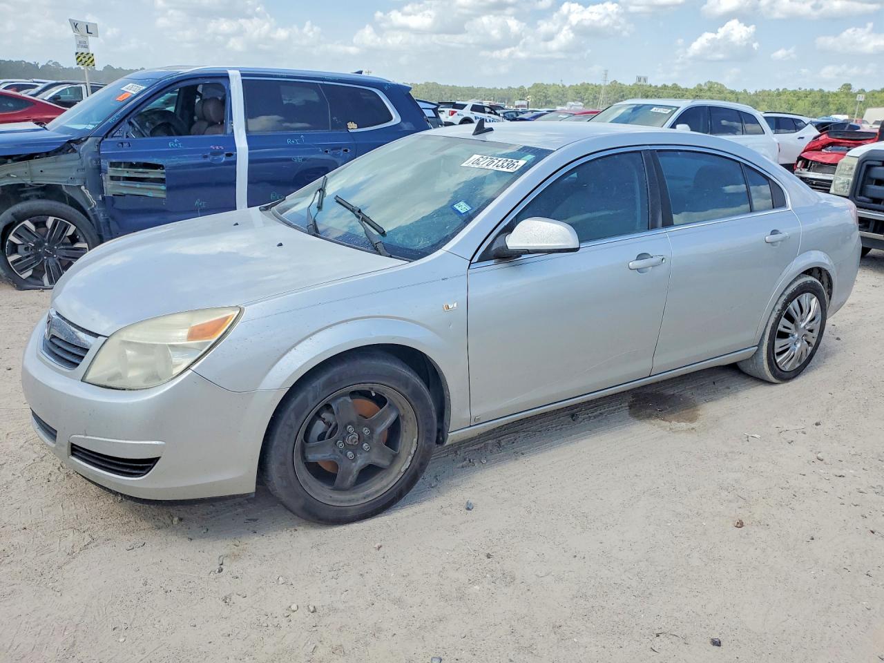 2009 Saturn Aura XE, VIN 1G8ZS57B79F140220 — Вода / потоп