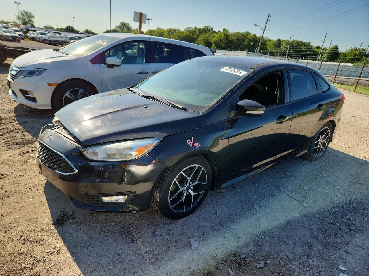 2015 Ford Focus SE, VIN 1FADP3F24FL340627 — Перед
