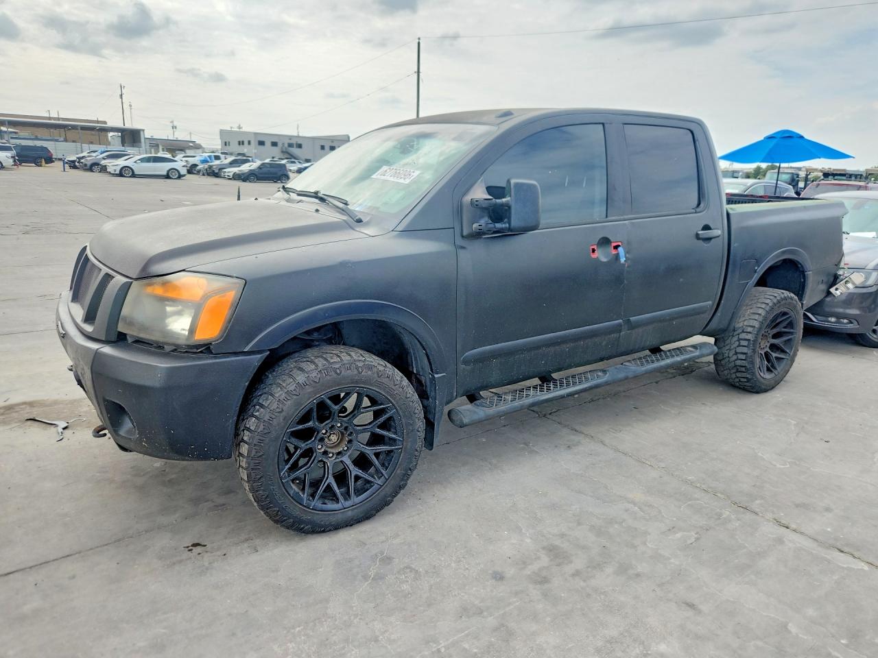 2012 Nissan Titan Pro-4X, VIN 1N6AA0EC7CN329819 — Rear end