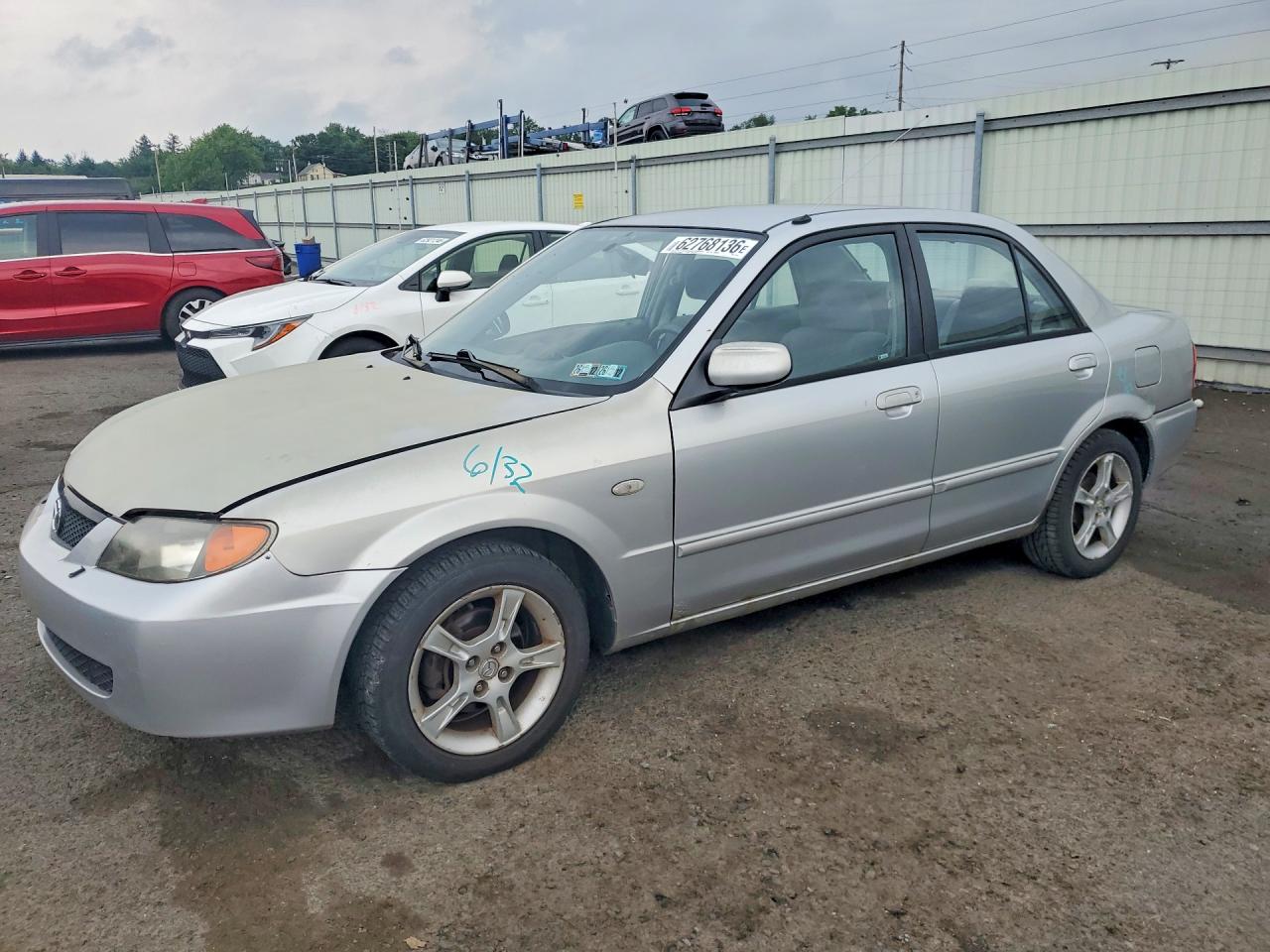 2003 Mazda Protege DX, VIN JM1BJ225X30171692 — Side