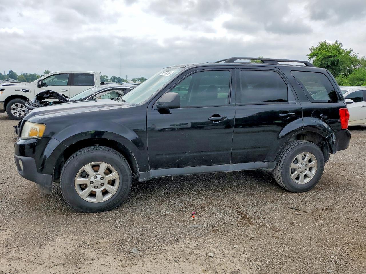 2009 Mazda Tribute Grand Touring, VIN 4F2CZ06G09KM02769 — Зад