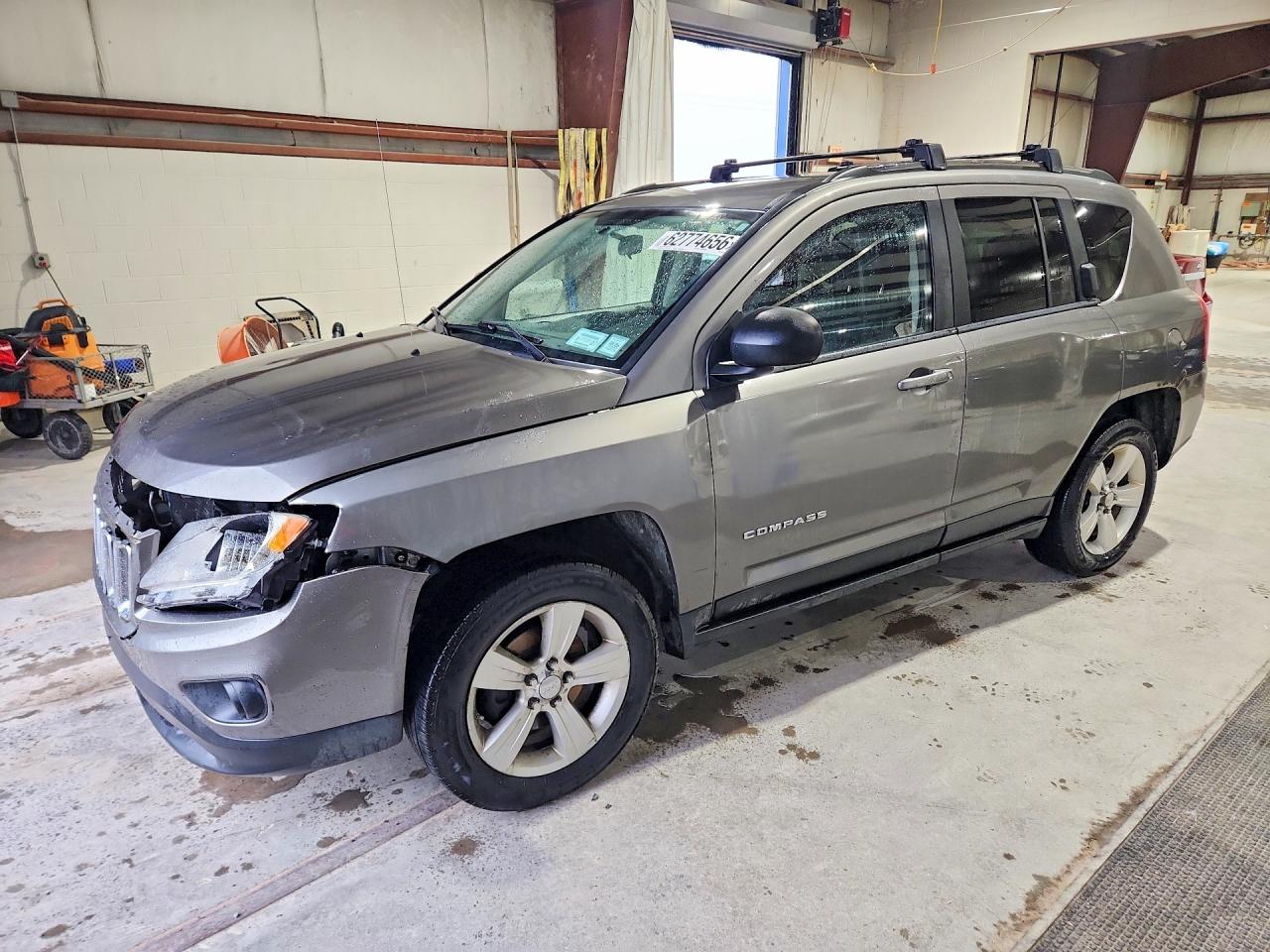 2012 Jeep Compass Sport, VIN 1C4NJCBAXCD662501 — Front end