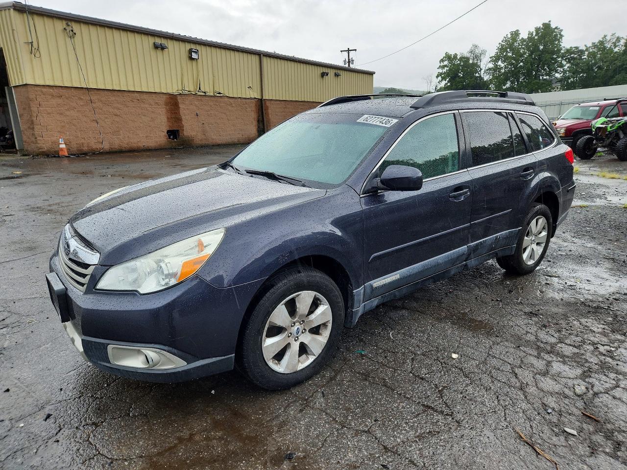 2012 Subaru Outback Limited, VIN 4S4BRDKC6C2231406 — Side