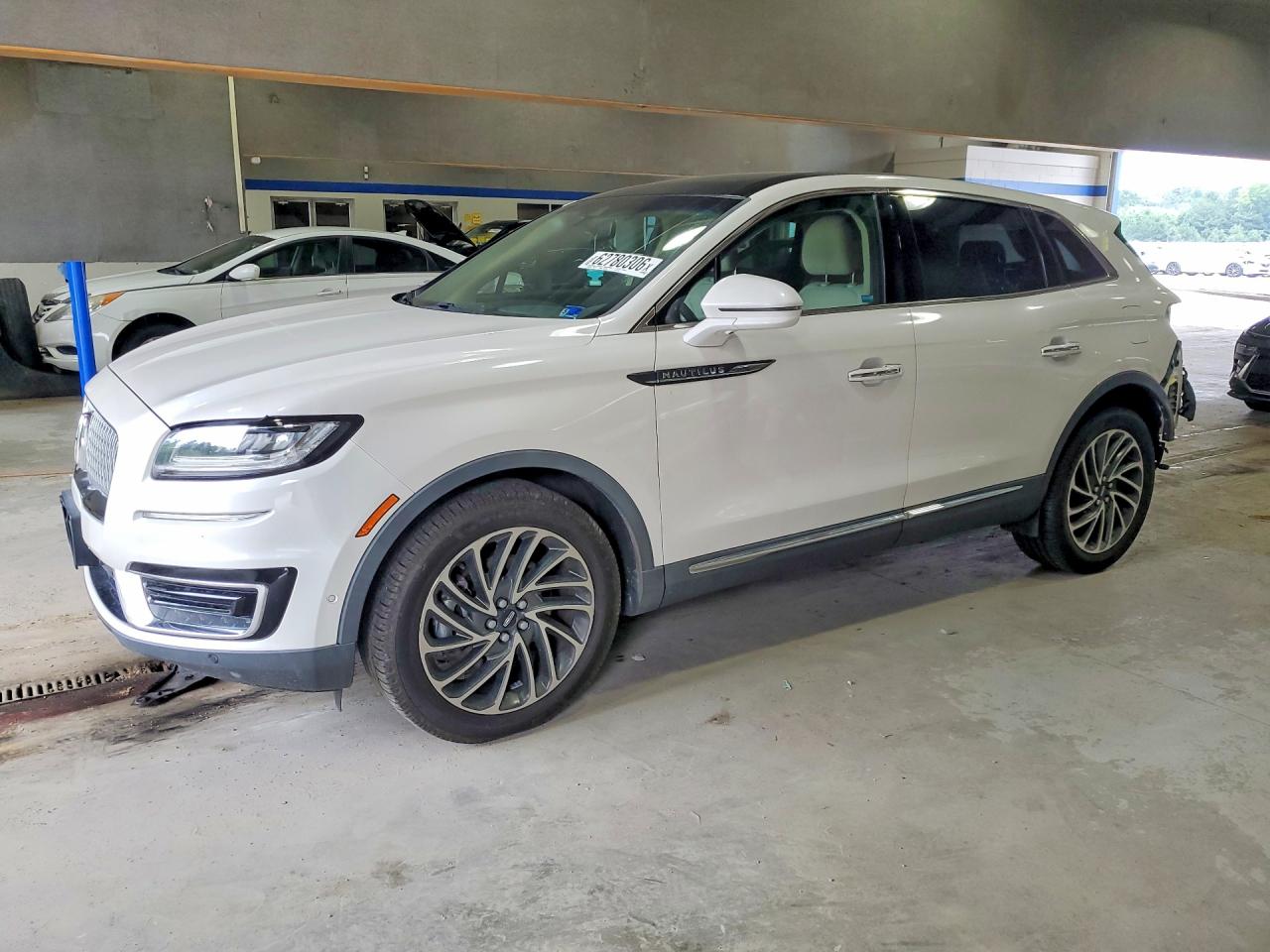 2019 Lincoln Nautilus Reserve, VIN 2LMPJ8L91KBL21471 — Rear end