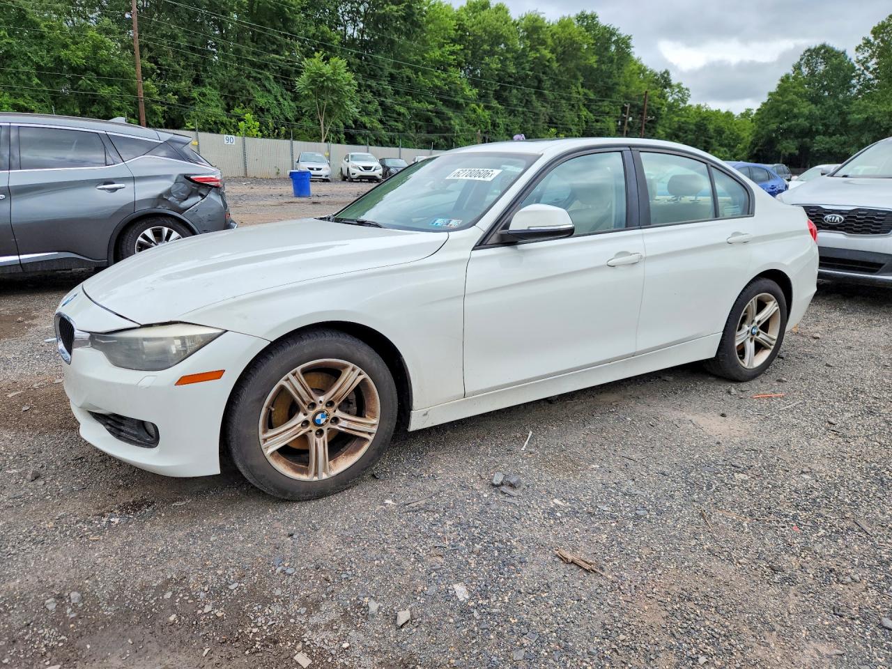 2013 BMW 3 Series 328i xDrive, VIN WBA3B5G51DNS04219 — Side