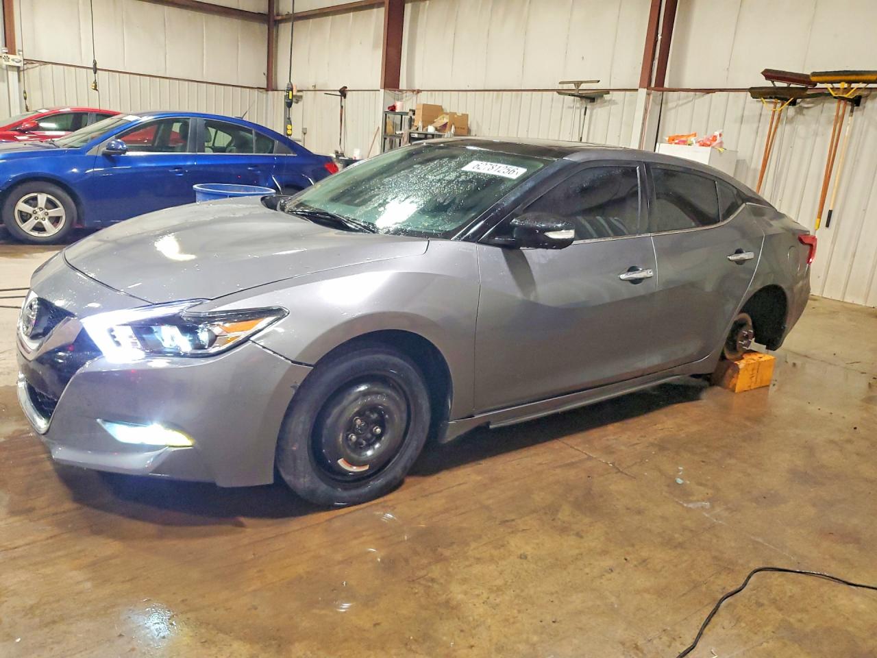 2016 Nissan Maxima SL, VIN 1N4AA6AP3GC447453 — Vandalism