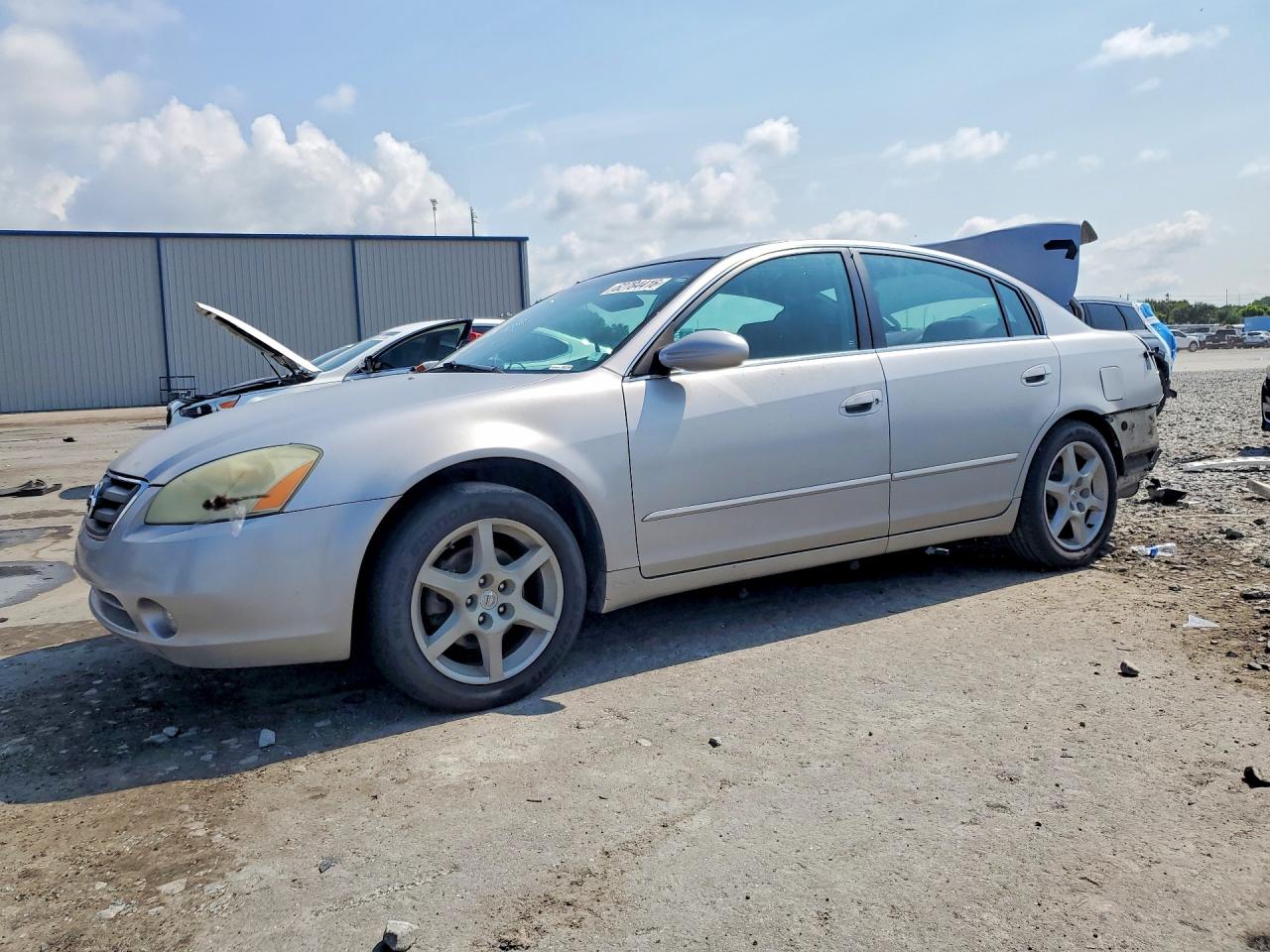 2004 Nissan Altima SE, VIN 1N4BL11D24C148197 — Зад