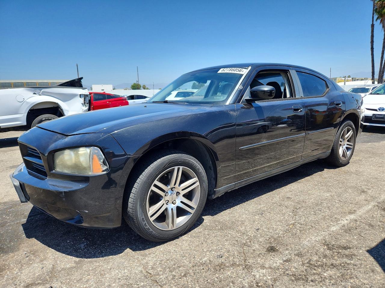2009 Dodge Charger Police, VIN 2B3KA43T19H597589 — Бок