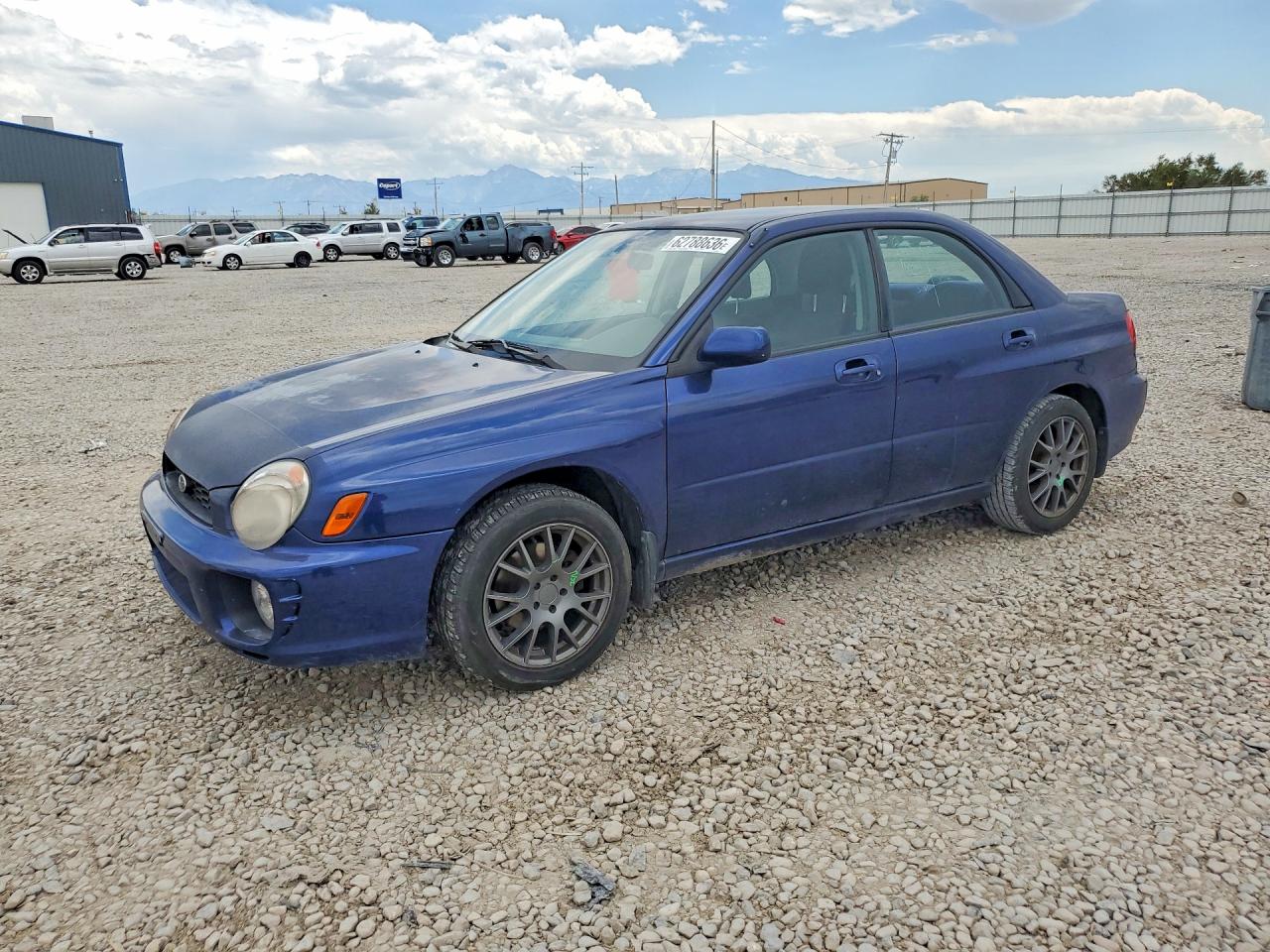 2002 Subaru Impreza RS, VIN JF1GD67532H519951 — Бок