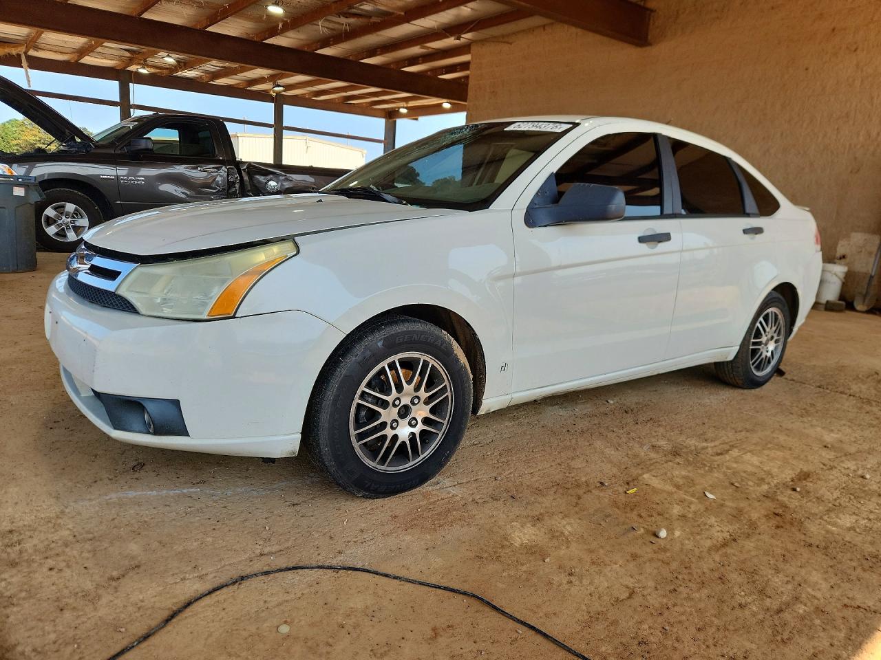 2010 Ford Focus SE, VIN 1FAHP3FNXAW150673 — Minor dents and scratches