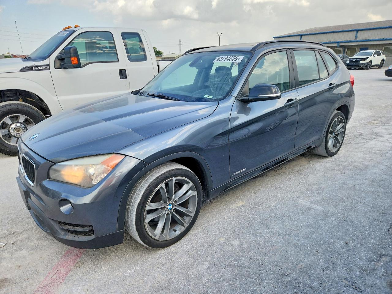 2014 BMW X1 xDrive28i, VIN WBAVL1C55EVY19023 — Front end