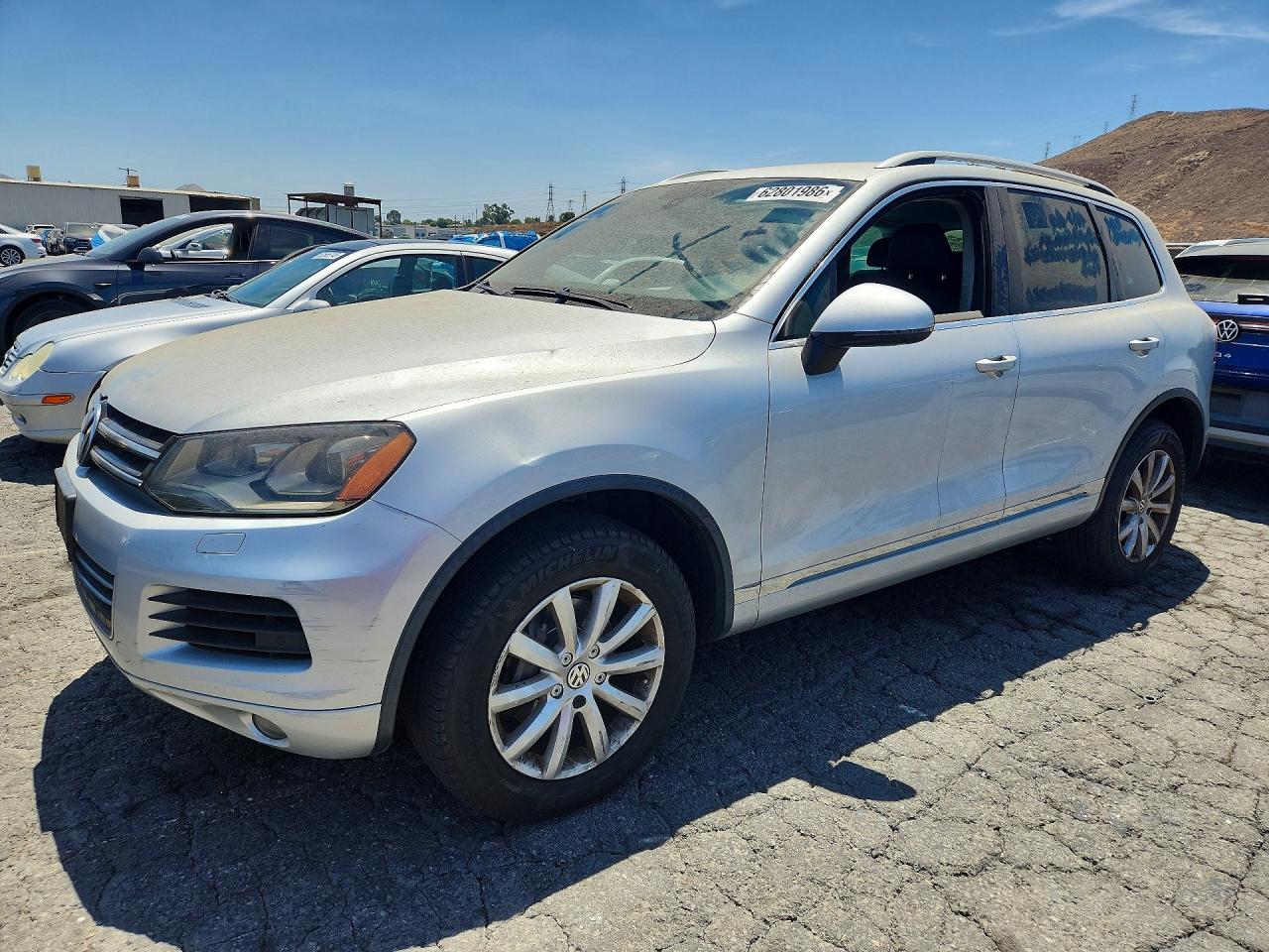 2012 Volkswagen Touareg Sport, VIN WVGFK9BPXCD004486 — Side