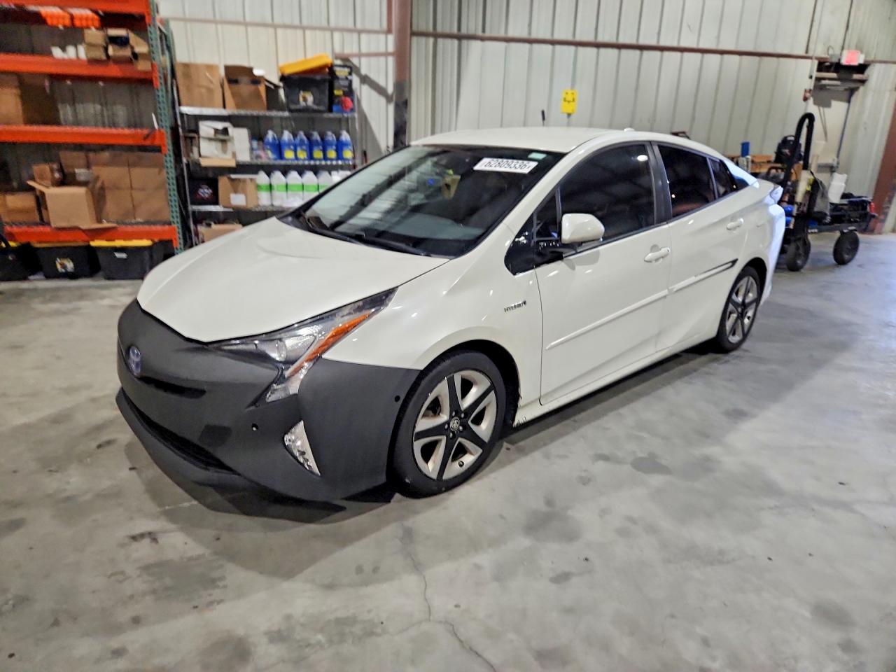 2016 Toyota Prius Three, VIN JTDKARFU6G3022758 — Side